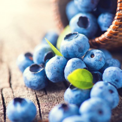 42872708 - blueberry on wooden background. ripe and juicy fresh picked blueberries closeup